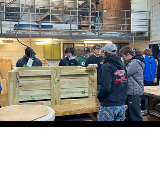 photo of Industrial tech students working on a planter